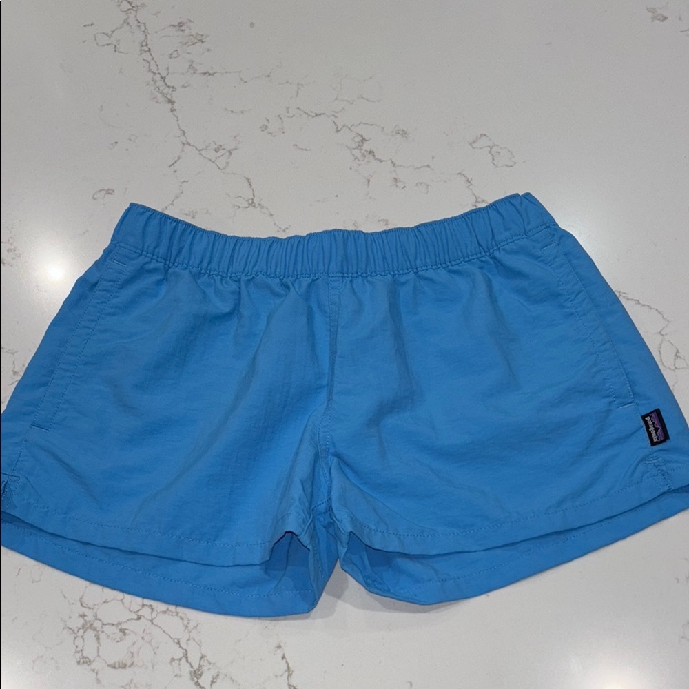 Patagonia “Baggies” Women's Athletic Light Blue Shorts, size small. EUC